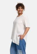 Tunica 'Crissa' – plissettata, leggera e modernamente asimmetrica